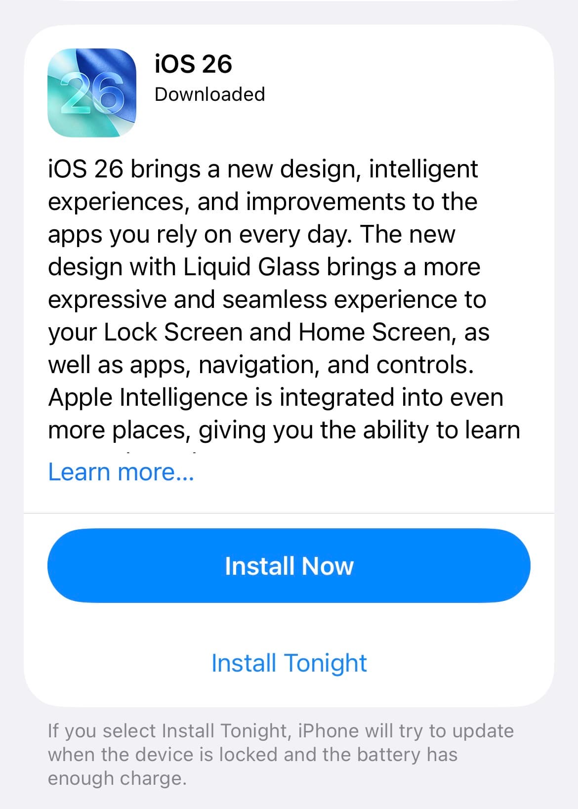 iOS 26 update screen with gradient icon.
