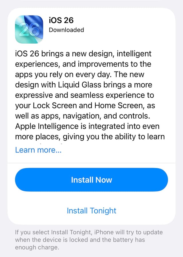 iOS 26 update screen with gradient icon.